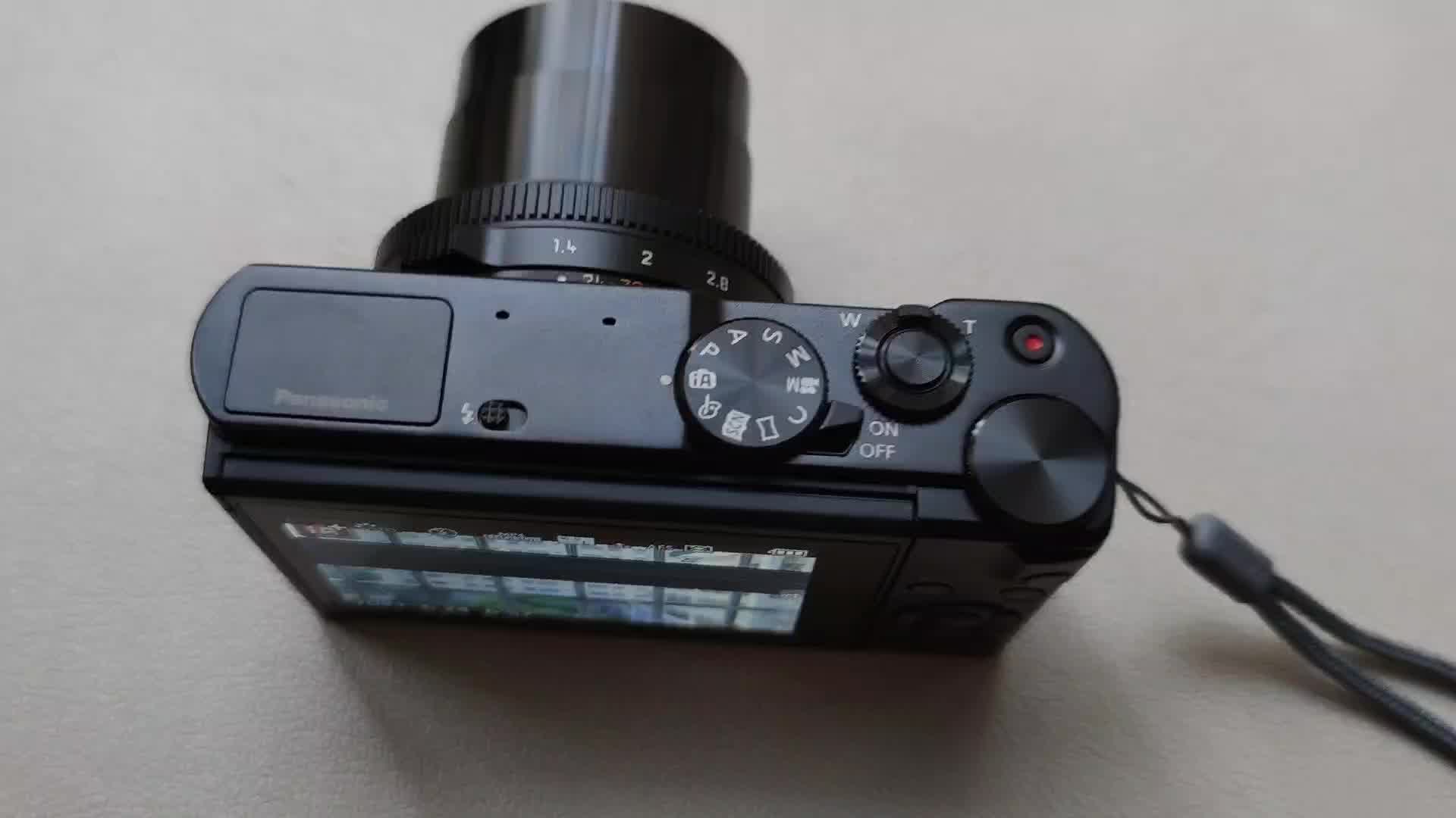 松下panasoniclx101英寸大底数码相机颜色黑卡片机vlog相机f14大光圈